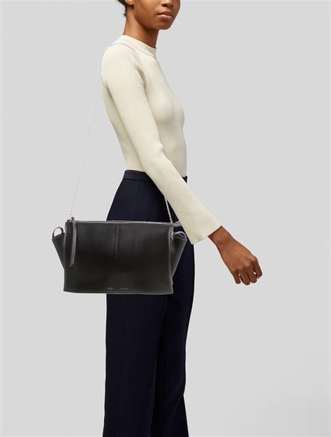 Celine Trifold Clutch on Chain Bag .